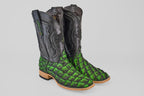 The Conor - Swamp Green - Square Toe boots feature black leather uppers, bright green scale-patterned lowers inspired by Pirarucu fish, and light tan soles and heels, shown on a light gray background.