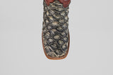 A detailed, top-down view of the Robinson - Newspaper - Square Toe boot highlights its textured Purarucu leather, brown trim, and white stitching—showcasing these distinctive handcrafted boots.