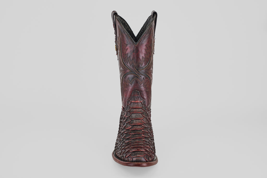 A single Tanner Jumbo - Black Cherry - Round Toe cowboy boot with detailed shaft stitching and reptile-embossed leather, shown from the front against a plain light background.