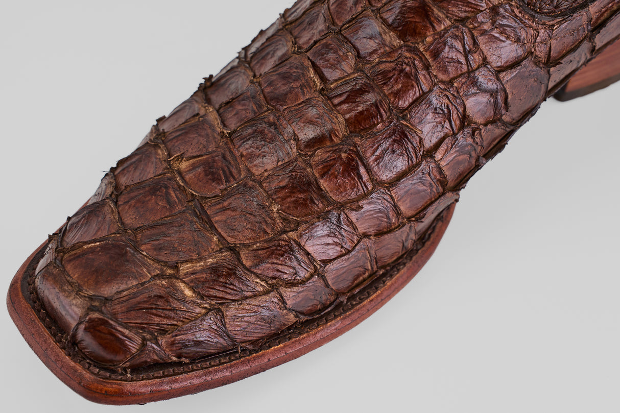 A close-up of the Conor - Brown - Narrow Square Toe boots highlights their detailed stitching and refined shape.