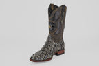 The Conor - Charcoal - Roper Toe is a men’s cowboy boot with scaly fish leather texture, decorative stitching, high shaft, brown and gray hues, roper toe, and a low wooden heel.