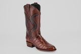 The James Platimun - Dark Cogñac - Roper Toe (Diamond) is a single men's brown leather western boot, featuring a pointed toe, alligator-patterned foot, decorative shaft stitching, and a low stacked heel on a light gray background.