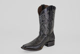The Python Black - Embossed Leather - Versy Toe (E202) cowboy boot features intricate silver embroidery on the shaft and a textured, pointed toe, shown on a light gray background—ideal for bold western style enthusiasts.