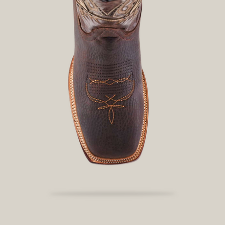 Top view of a Cheyenne Chocolate cowboy boot with intricate stitching on the square toe. The premium cowhide design features detailed embroidery and a textured pattern, all photographed against a plain white background.