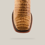 Top view of the Caiman Belly Print Orix - Square Toe boot, featuring a textured cowhide with a square toe, caiman belly print, and detailed stitching in brown, set against a white background.