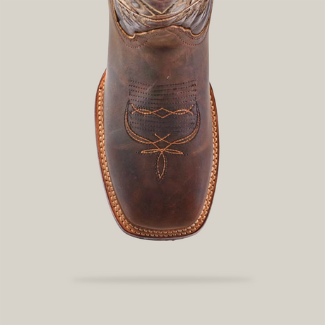 Top view of the Azkar Tan - Square Toe boot, crafted from premium cowhide leather with intricate stitching on a white background. It showcases a brown leather design with a square toe and visible sole stitching, reflecting artisanal excellence and craftsmanship.