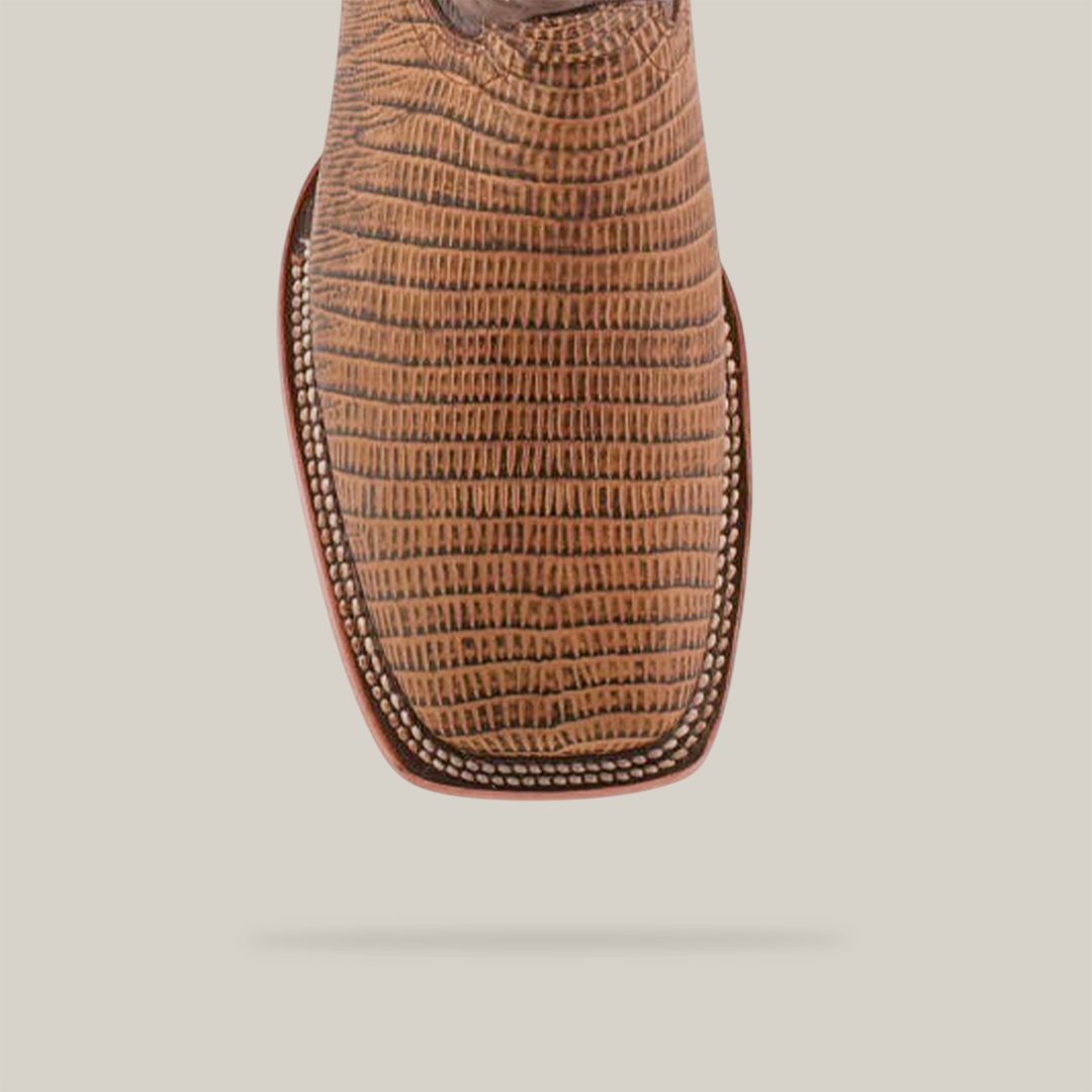 The Lizard Print Tabaco - Square Toe boot, made of handmade brown leather with detailed stitching and a lizard print texture, is showcased on a plain white background.