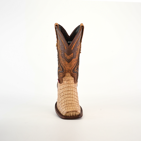 The Exotic Caiman Hornback - Orix - Rodeo Toe is a single cowboy boot made from premium leather, showcasing a light tan, textured lower and a darker brown, intricate design on the upper shaft against a plain white background.