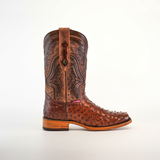 The Exotic Ostrich - Brown - Rodeo Toe boot showcases superior craftsmanship with an ornate, dark brown leather shaft and a textured light brown ostrich leather foot. Intricate stitching adorns the design, while a light wooden sole elevates it elegantly against a plain white background.