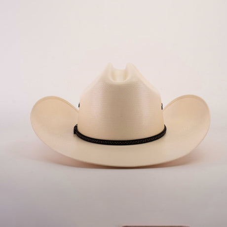 The 500X Country Straw Hat is a cream-colored cowboy hat featuring a black braided band, wide brim, and classic curved shape, crafted from premium materials and set against a plain white background.