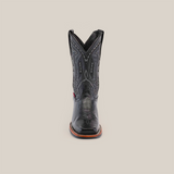 Front view of the Barcelona Black cowboy boot, boasting a Rodeo toe and slip-resistant sole. Crafted from premium cowhide with intricate stitching, this boot showcases a decorative design against a plain white background.