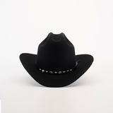 The X 2 Carnales Black is a felt cowboy hat, featuring a wide brim and decorative band with metal accents, ideal for western headwear, showcased against a white background.