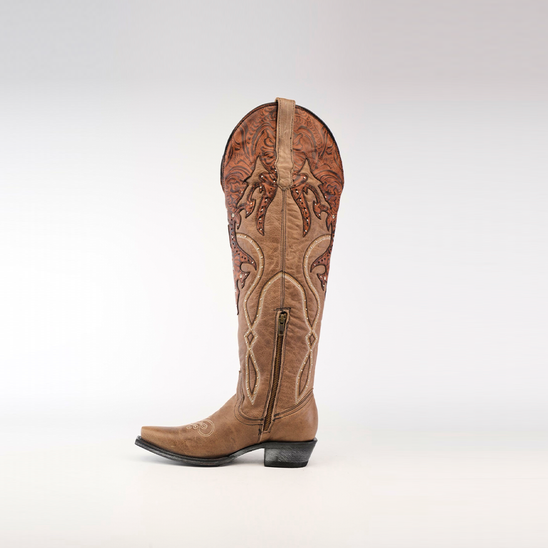 The Miriam Cappuccino - Tall Shaft - Snip Toe boot is a brown cowboy masterpiece with intricate floral embroidery and stitching. Featuring a side zipper, pointed toe, and black heel, its elegantly set against a white background.