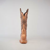 A single cowboy boot from the Eden Rose Gold collection stands upright against a plain background, featuring intricate dark stitching on its light tan leather with a smooth finish. The tall shaft and narrow square toe add elegance to this striking piece.