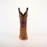 The Grecas Orix - Square Toe boot combines fashion and functionality with a premium leather design, brown lower, and purple embroidered upper adorned with floral patterns. This stylish boot features convenient pull straps, ideal for girls collections. Displayed on a white background.