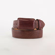 The Exotic Full Quilt Lizard - Brown Belt, coiled with a rectangular buckle, showcases sophistication on a plain white background. Its brown, textured leather elevates its appeal as a luxury accessory.