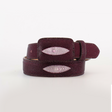 The Exotic Full Quilt Stingray - Wine Belt features a maroon stingray leather design with a rectangular buckle and textured white diamond-shaped inlays. Displayed on a plain white background, its exotic beauty captivates from every angle.