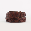 The Exotic Full Quilt Pirarucu Fish - Matte Brown Belt features a coiled design with a rectangular buckle and a textured pattern resembling woven strips. Its brown leather exudes rugged elegance with a glossy finish, set against a plain white background.