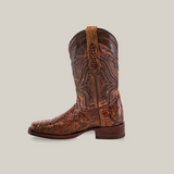 Displayed against a plain background is the Exotic Python - Brown - Rodeo Toe cowboy boot, showcasing intricate stitching and textured python leather. With its pointed toe, low heel, and pull strap at the top, this boot seamlessly combines classic design with exotic flair.