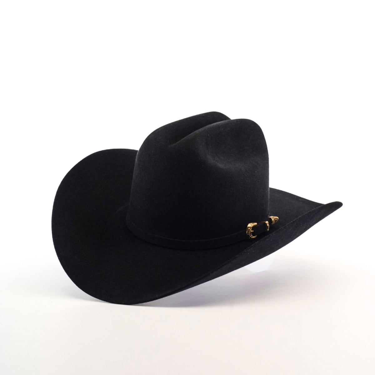 The 5X Dorado Black by Milano Hat Co. is a western hat made from wild rabbit and beaver fur felt, featuring a wide brim and a gold buckle on the hatband, set against a white background.