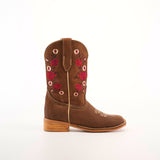 The Mia Copper Suede - Square Toe cowboy boot, with premium brown leather, a wooden sole, and red rose and white flower embroidery, is showcased in profile against a plain white background.