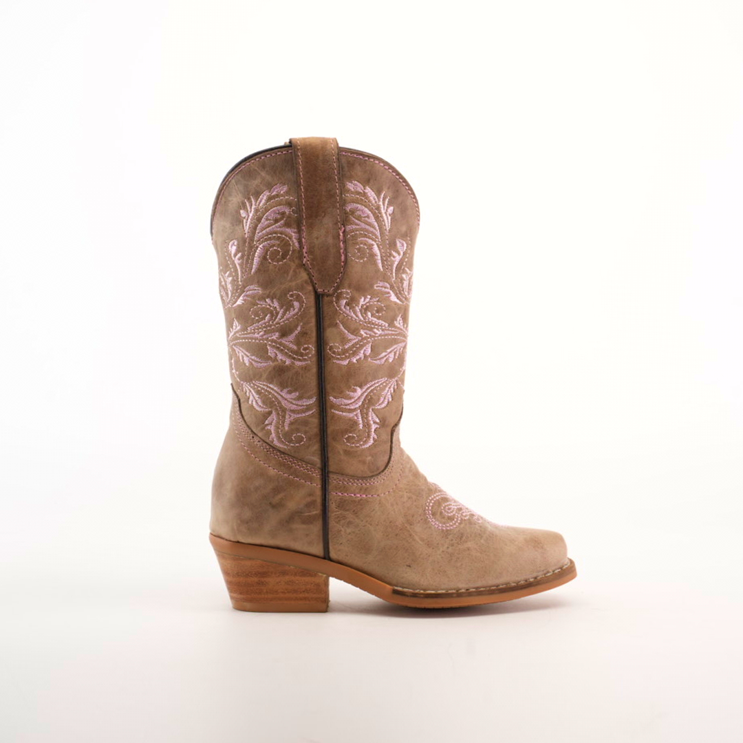 The Bellere Fawn - Snip Toe boot is expertly handcrafted from premium cowhide leather, boasting a tan design with decorative pink stitching on the shaft, a snip toe, and a wooden heel, all showcased against a pristine white background.