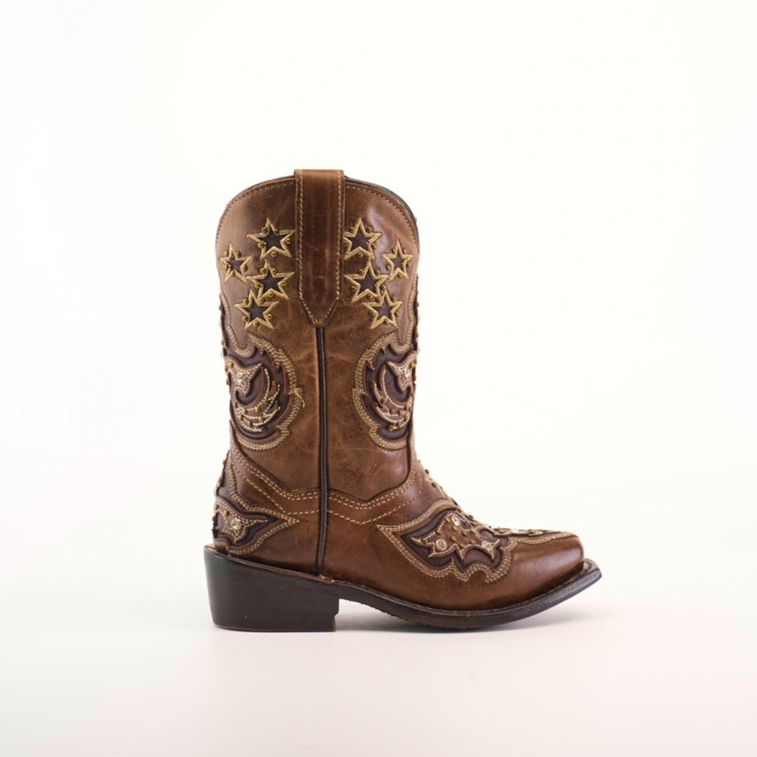 A brown cowboy boot made from premium cowhide leather with star and swirl embroidery, a low heel, and a pull strap; the Chantal Crystals Camel Snip Toe boot is showcased against a plain white background.