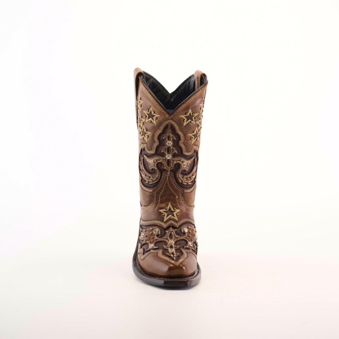 Front view of the Chantal Crystals Camel - Snip Toe cowboy boot in brown cowhide leather, with intricate floral and star embroidery on the shaft and toe. The glossy finish highlights expert craftsmanship, allowing it to stand upright against a plain white backdrop.