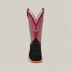 The Colt - Black - Square Toe is a mens boot featuring a black suede foot, brown sole, and tall maroon shaft with white stitching, shown facing forward against a plain light background.