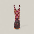 The Maverick - Wild Cherry - Square Toe boot features a dark brown textured lower, a red upper shaft with yellow and orange stitching, and a square toe, displayed facing forward against a plain light background.