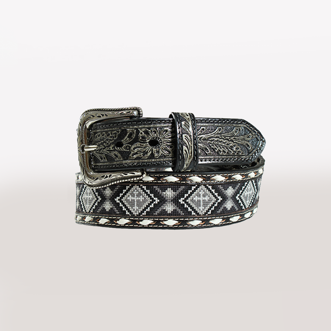 The Nocona Western Mens Belt in black leather features a buckle and tip with intricate floral engravings. It boasts a Western elegance with a stylish beaded cross and geometric diamond pattern in white and gray, bordered by sophisticated stitched detailing.