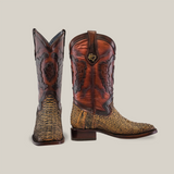 The Exotic Python - 4G - Vintage Honey boots capture the cowboy spirit with textured woven designs, intricate leather detailing, and a two-tone dark brown and light pattern. They feature a durable Goodyear welt sole and square toe for lasting durability.