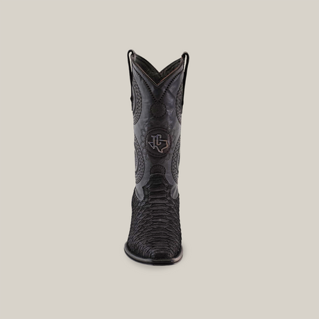 The Exotic Python - Platinum - Matte Black boot from the Platinum Collection features intricate python leather detailing, a signature emblem on the front, a Versy toe, and a high shaft, all set against a plain white background.