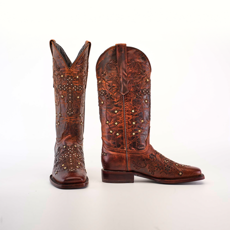 The Marga Cruz Brick Mid Shaft boots showcase a square toe design, crafted from premium leather with intricate floral patterns and studded details. The left boot highlights the front, while the right side view reveals their classic handcrafted elegance.