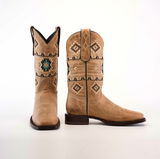 The Palles Aztec Stitch Fawn boots feature a tan color, Aztec-inspired stitching, and turquoise starburst designs. Made with premium leather for a slightly worn look, they have genuine leather soles and dark brown heels. Positioned side by side on a plain white background, theyre truly striking.