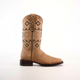 The Palles Aztec Stitch Fawn boot features intricate Aztec-inspired stitching in brown and black on a tan short shaft. It has a classic western style with a square toe, genuine leather sole, and is displayed against a plain white background.