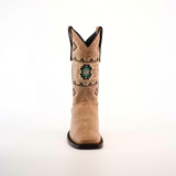 The Palles Aztec Stitch Fawn boot, with a short shaft and square toe, is crafted from premium leather. It features intricate Western-style patterns centered around a teal and brown geometric design, highlighting expert craftsmanship against a plain white background.