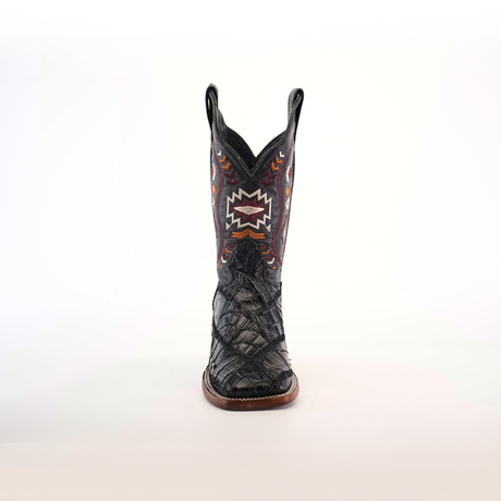 The Exotic American Alligator Patchwork Black Square Toe boot showcases a variety of textures and multicolored geometric patterns on exotic leather, with a slightly pointed toe and sturdy wooden sole, set against a plain white background.