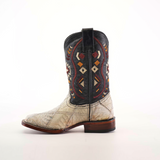 The Exotic American Alligator Patchwork Bone Square Toe boot features a beige alligator-textured foot and a black shaft with colorful geometric patterns. Its square toe design and wooden heel create a classic western style against a plain white background.