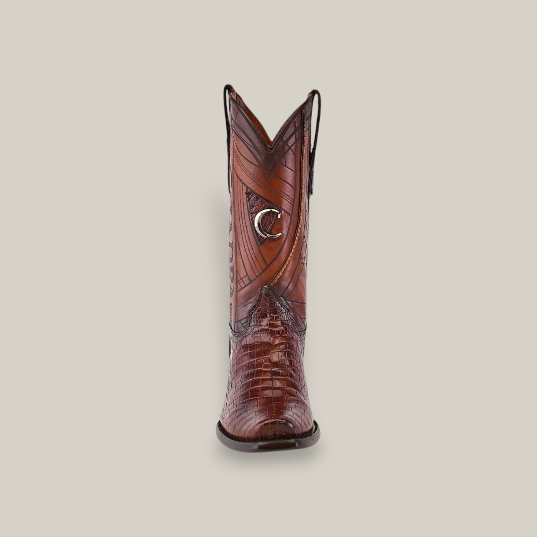 Front view of the Brown Moreletii Laser & Embroidery Cowboy Boot (CU700) with embossed leather and a silver horseshoe emblem, featuring laser-engraved alligator patterns, set against a light gray background.