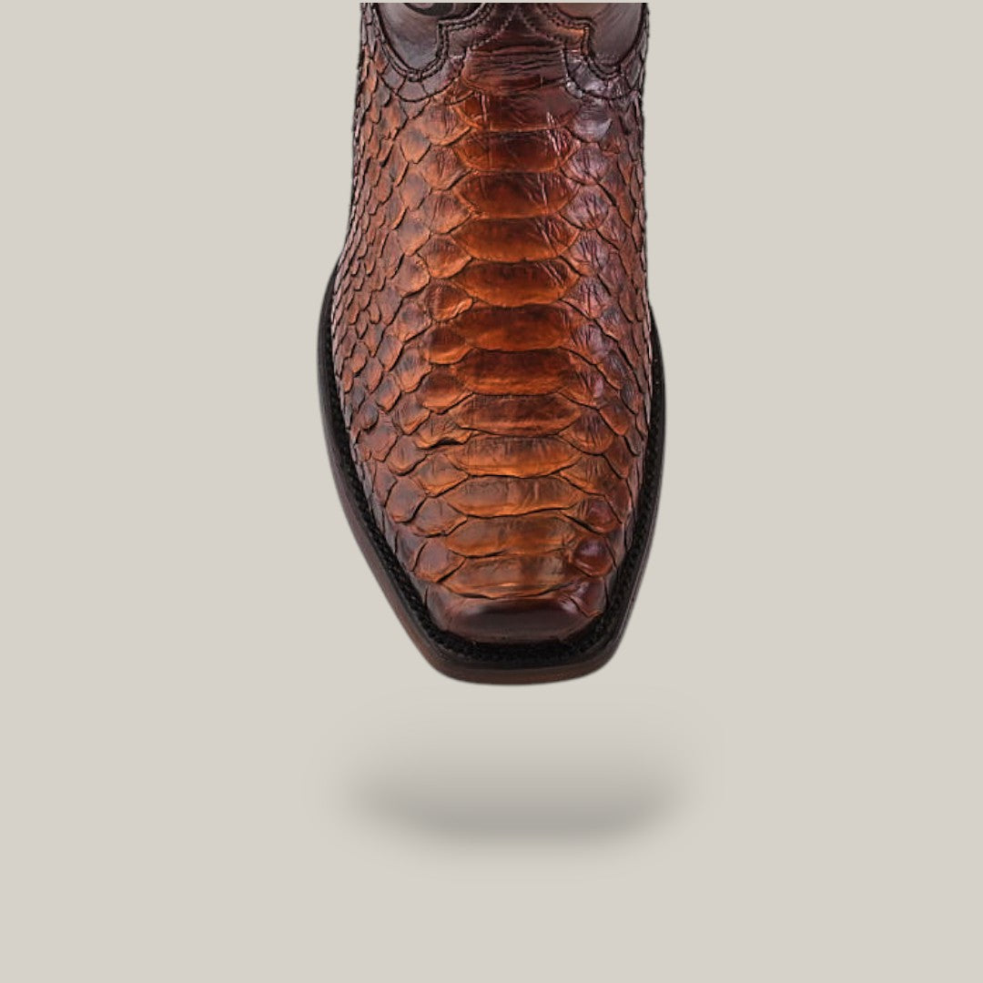 The Over Brown Python Laser & Embroidery shoe, featuring a narrow square toe and textured reptile skin pattern, is centered against a plain light gray background, showcasing intricate detailing and a polished finish.