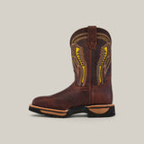 The Floter Brown Composite Toe - E6187 cowboy boot stands upright on a light gray background. It features intricate yellow stitching, a black sole, pull strap, detailed embroidery along the shaft, and rugged durability.