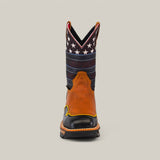 The Crazy Honey Composite Toe - E6296 cowboy boot boasts a brown leather lower and black toe. Its upper has blue stripes and white stars on a dark base, echoing Texas Country Work Boots. Crafted for durability, it’s displayed against a plain, light-colored background.