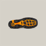 The image displays the sole of the Crazy Honey Soft Toe - E6296 Texas Country Work Boot, designed for durability and traction. It features an orange center with black geometric tread patterns, ideal for outdoor activities, all set against a plain gray background.