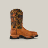 Side view of the Alazan Sand Soft Toe - E6081, a brown cowboy boot with a camouflage-patterned shaft. This Texas Country Work Boot includes a round toe, pull straps, and a black rubber sole for durable comfort on any journey.