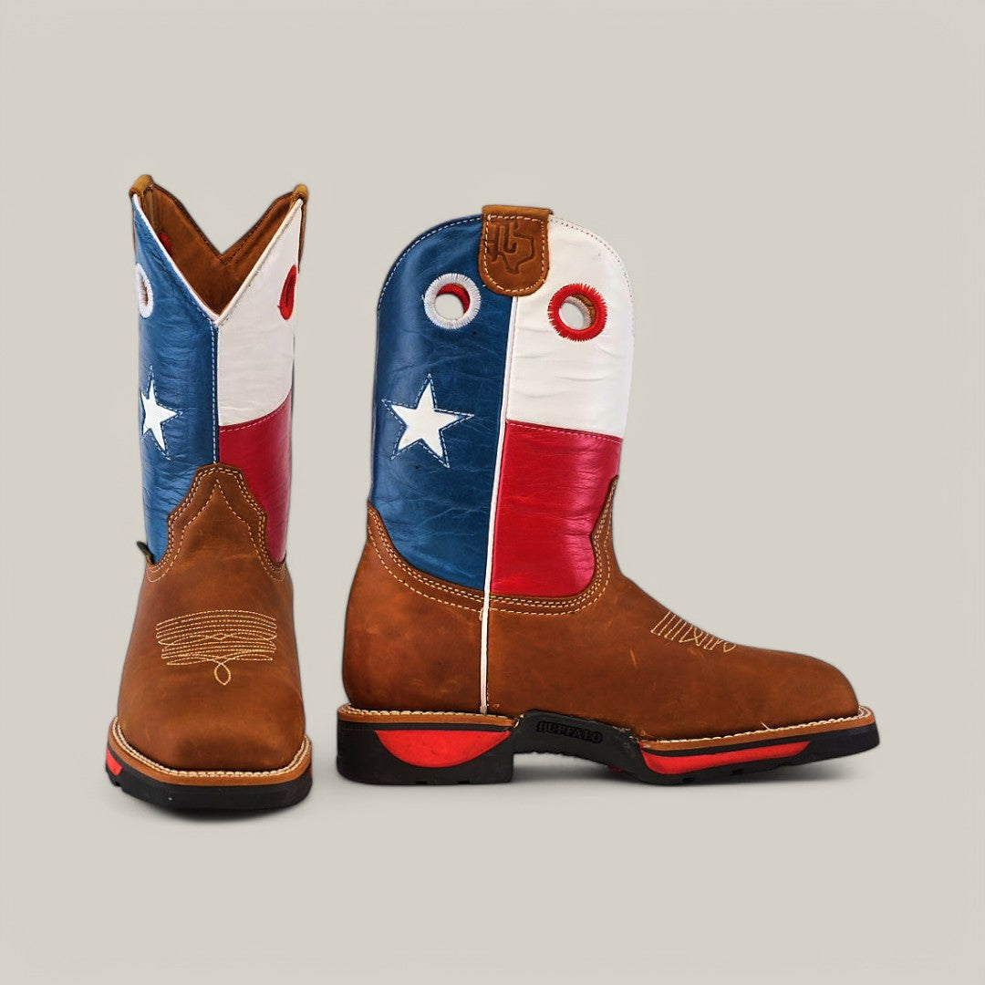 The Texas Honey Composite Toe - E6082 boots feature brown leather feet with blue, white, and red flag-like shafts. One stands upright, the other angled, both adorned with star designs and detailed stitching that emphasize their durability.