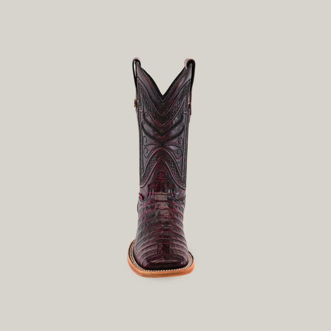 Front view of the Exotic Caiman Belly in Black Cherry, a square-toe cowboy boot with intricate stitching and a wooden sole, set against a plain light background.