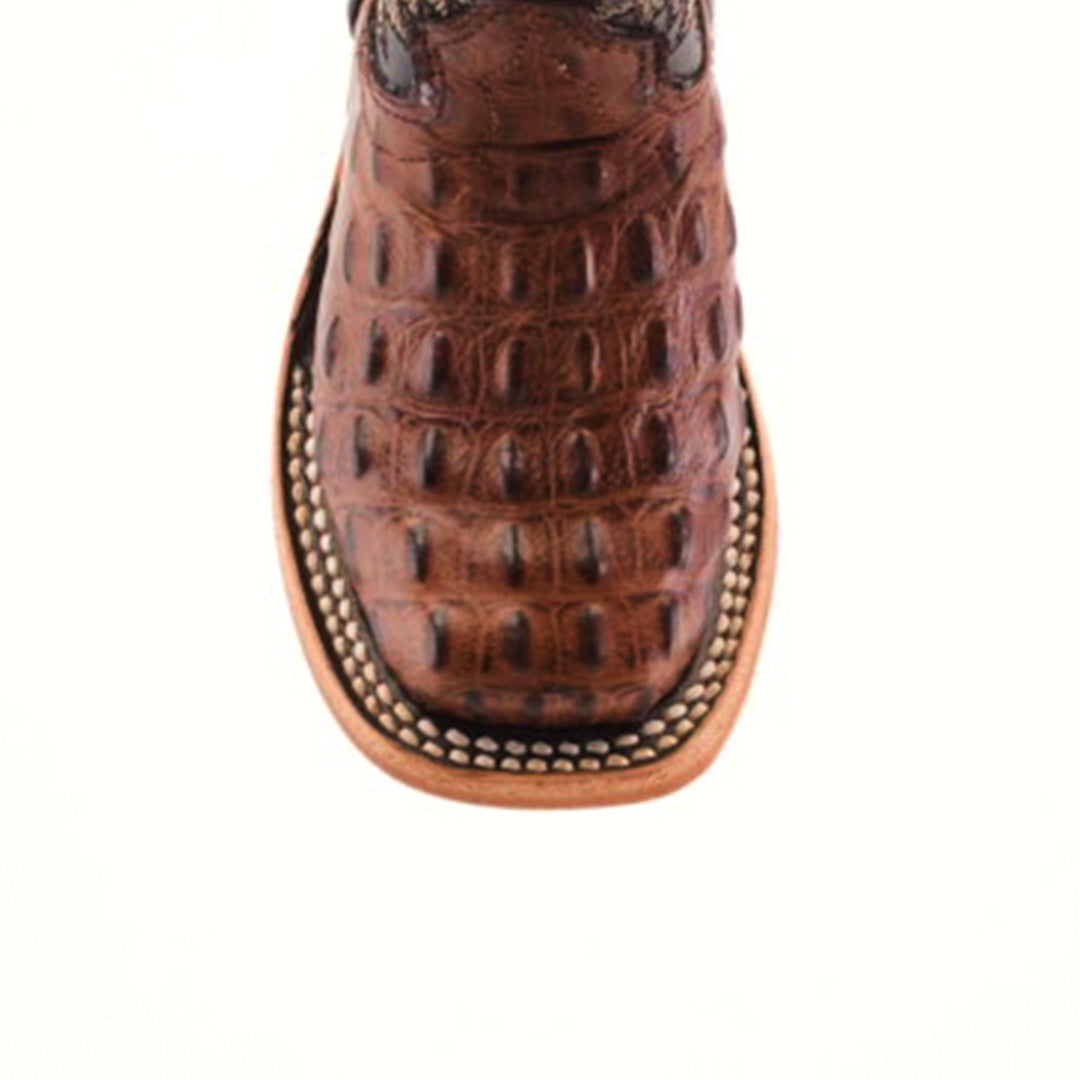 A detailed view of the Caiman Hornback Print Chocolate Square Toe cowboy boot highlights its Western style with a textured reptile pattern, intricate stitching on the leather toe, and a sturdy sole set against a plain white background.