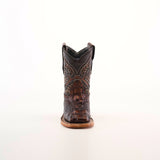 The Alligator Head Print Rustic Honey Square Toe boot, meticulously handcrafted from premium leather, features intricate stitching against a plain white background. With its distinctive square toe and low heel, it embodies timeless western fashion.