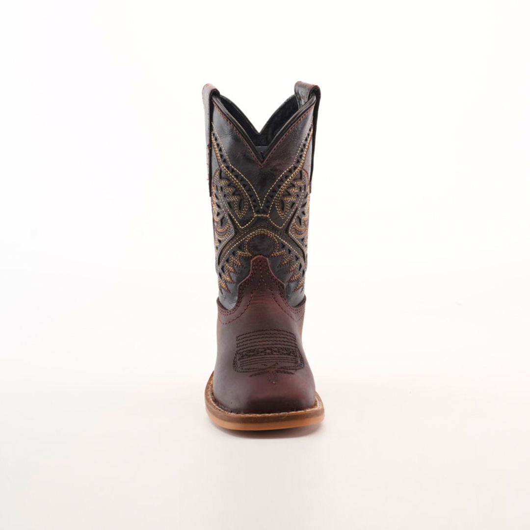 Front view of the Salvage Almond Square Toe, a single brown cowboy boot made from premium cowhide leather, showcasing intricate stitching and a pointed toe, set against a plain white background.